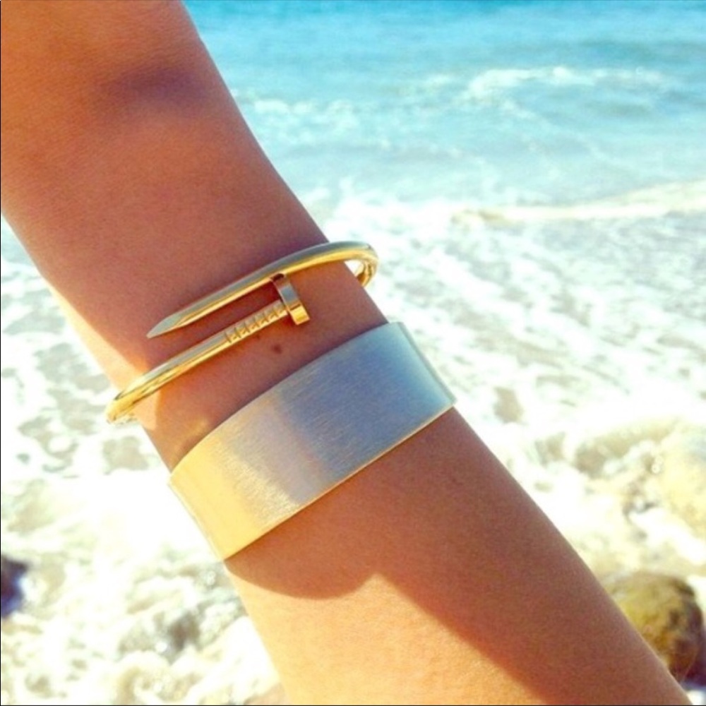 Gold wrapped nail bracelet